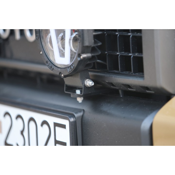 Mocowanie lamp przed / za atrapą Toyota Land Cruiser J250 - More 4x4