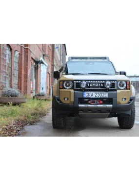 Mocowanie lamp przed / za atrapą Toyota Land Cruiser J250 - More 4x4
