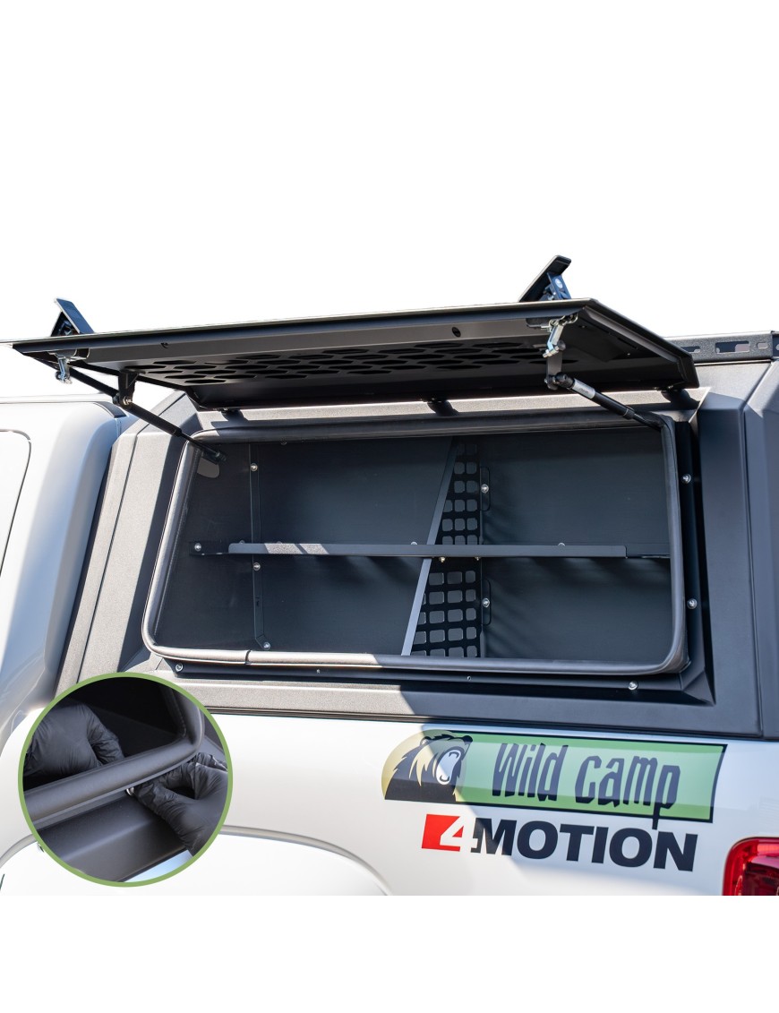 Wild Camp steel side storage box seen through the open side window of a pickup hardtop canopy